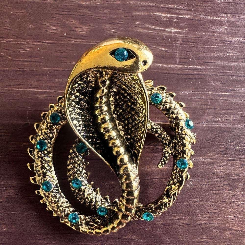 King Cobra Brooch with stones. Good Tone.